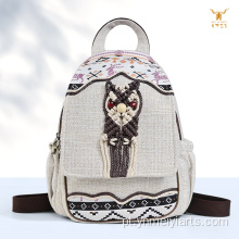 Mochila feita à mão em tecido de cera bordada com coruja Boho